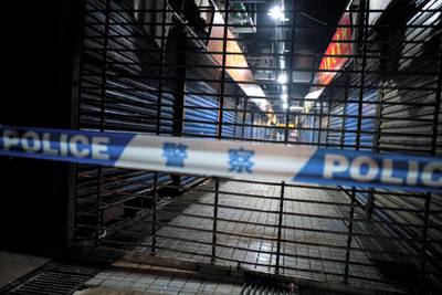 Members of staff of the Wuhan Hygiene Emergency Response Team conduct searches on the closed Huanan Seafood Wholesale Market in the city of Wuhan, in the Hubei Province, on January 11, 2020, where the Wuhan health commission said that the man who died from a respiratory illness had purchased goods. - China said on January 11, 2020 that a 61-year-old man had become the first person to die from a respiratory illness believed to be caused by a new virus from the same family as SARS (Sudden Acute Respiratory Syndrome), which claimed hundreds of lives more than a decade ago. Forty-one people with pneumonia-like symptoms have so far been diagnosed with the new virus in Wuhan, with one of the victims dying on January 8, 2020, the central Chinese city's health commission said on its website. (Photo by NOEL CELIS / AFP)