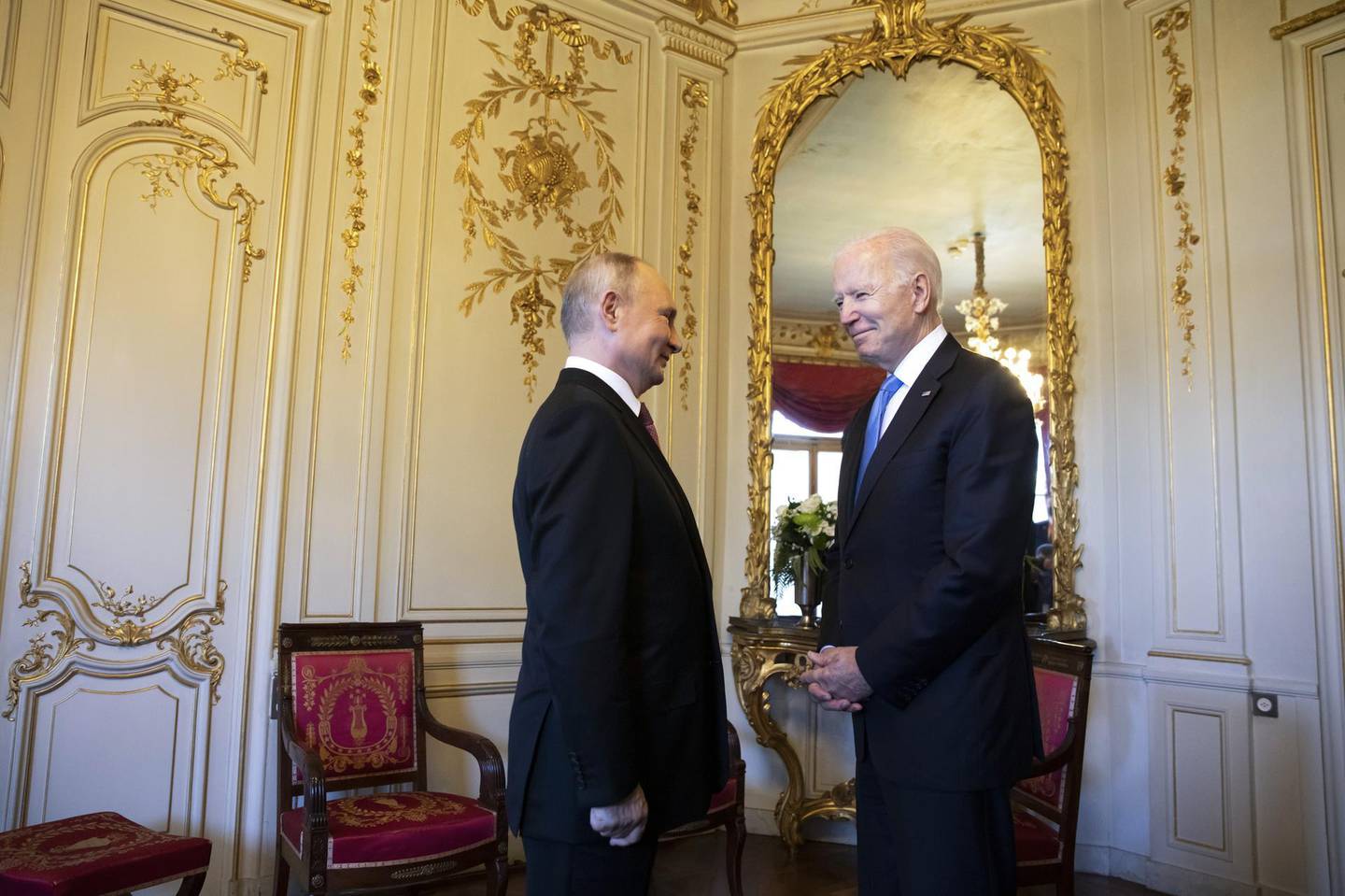 MANDATORY CREDIT. NO SALES. NO ARCHIVES. Vladimir Putin, Russia's president, left, and U.S. President Joe Biden, right, react at the start of the U.S. Russia summit at Villa La Grange in Geneva, Switzerland, on Wednesday, June 16, 2021. Joe Biden and Vladimir Putin kick off what could be more than four hours of meetings on Wednesday afternoon in Geneva, with officials from both countries keeping expectations low for any breakthrough agreement. Photographer: Peter Klaunzer/Swiss Federal Office of Foreign Affairs/Bloomberg