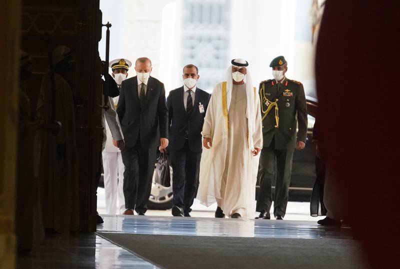 President Erdogan and Sheikh Mohamed bin Zayed arrive at Qasr Al Watan in Abu Dhabi. AP Photo / Jon Gambrell