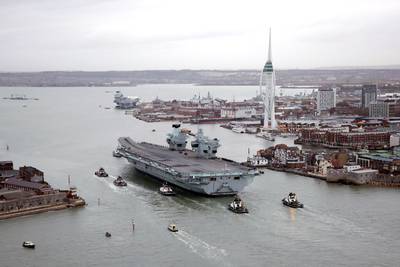 HMS Queen Elizabeth returns to Portsmouth Naval Base last December after her global seven-month deployment to the Indo-Pacific. PA