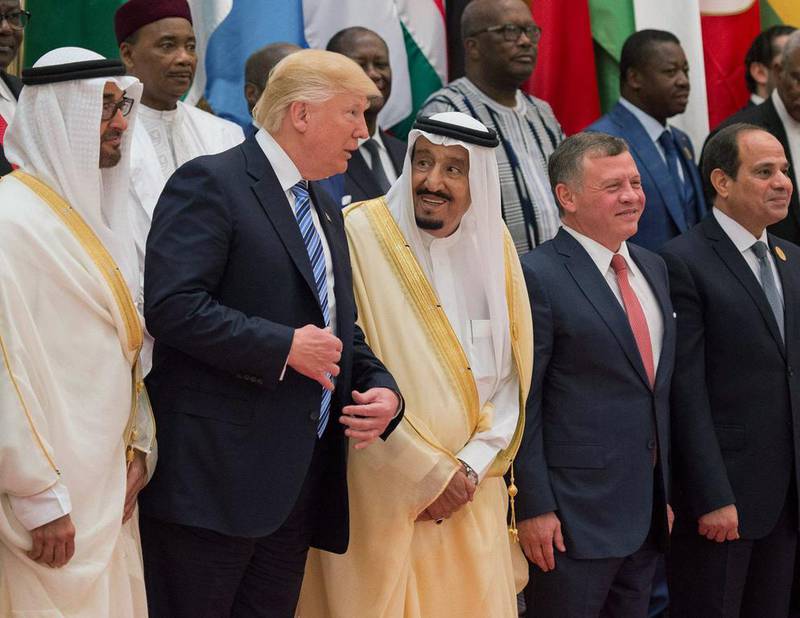 King Salman of Saudi Arabia and US president Donald Trump taking part in a group photo at the opening session of the Gulf Cooperation Council summit in Riyadh, Saudi Arabia. EPA/ Saudi Press Agency