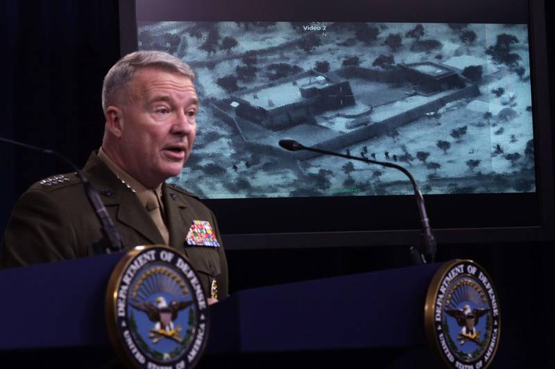 ARLINGTON, VIRGINIA - OCTOBER 30: U.S. Marine Corps Gen. Kenneth McKenzie, commander of U.S. Central Command, speaks as a picture of the operation targeting Abu Bakr al-Baghdadi is seen during a press briefing October 30, 2019 at the Pentagon in Arlington, Virginia. Gen. McKenzie and Hoffman spoke to the media to provide an update on the special operations raid that targeted former ISIS leader Abu Bakr al-Baghdadi in Idlib Province, Syria.   Alex Wong/Getty Images/AFP
== FOR NEWSPAPERS, INTERNET, TELCOS & TELEVISION USE ONLY ==
