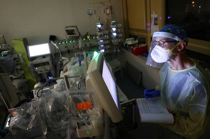 Head nurse Gunnar Goelzenleuchter hard at work at the coronavirus ICU at a clinic in Darmstadt, Germany. Reuters