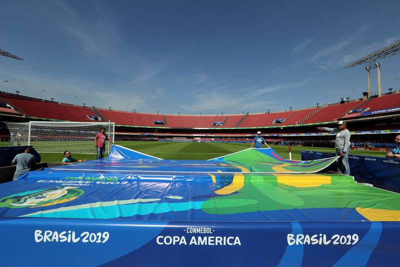 Workers prepare a decoration at Morumbi Stadium in Sao Paulo, Brazil ahead of the 2019 Copa America. The tournament will be held in Brazil from June 14-July 7. EPA