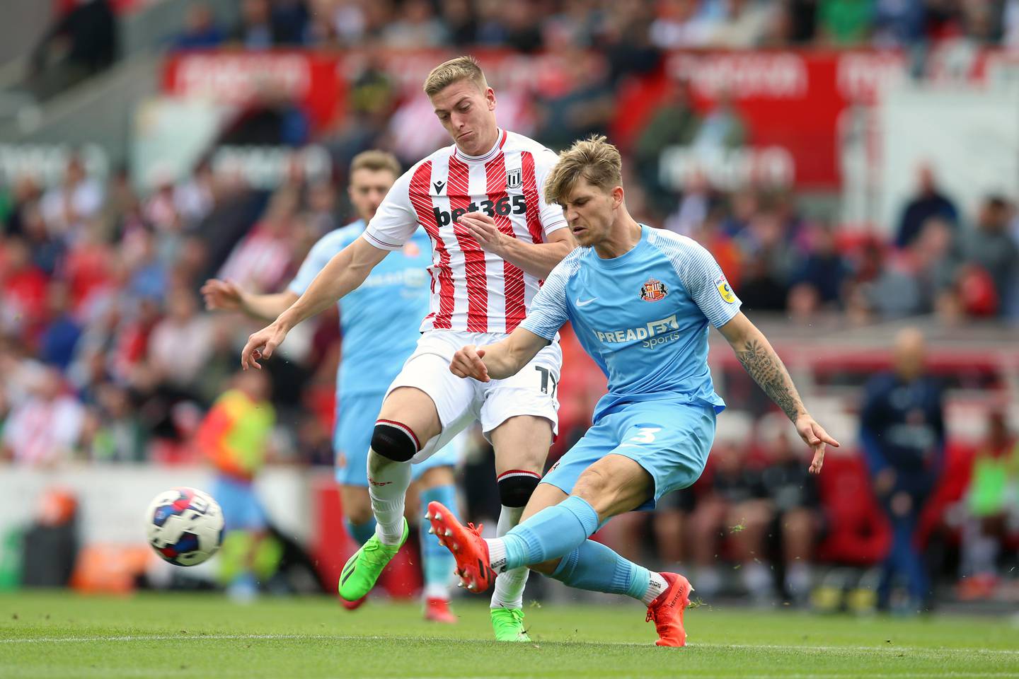 Stoke City's Liam Delap and Sunderland's Dennis Cirkin battle for the ball in the Sky Bet Championship match at the bet365 Stadium, Stoke. on August 20, 2022. PA