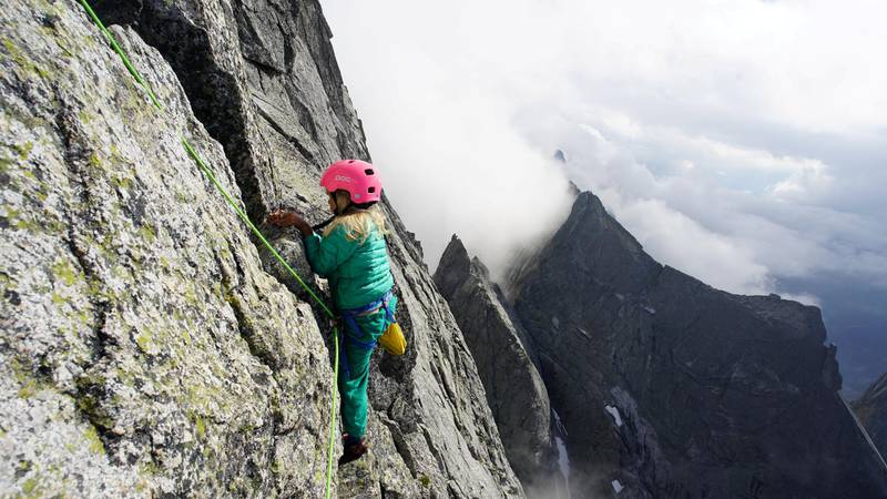 **Sent under embargo, no use before 14.00pm BST August 3 2020**
Freya Houlding on a three day trip to climb Piz Badile. See SWNS story SWPLclimb; A toddler and his seven-year-old sister have smashed records to become the youngest mountain climbers to scale a massive 10,000ft peak and were given a reward - of Haribo. Freya Houlding, seven, and three-year-old Jackson were literally following in their professional climber father's footsteps as he led them up Piz Badile on the border of Switzerland and Italy. Dad Leo Houlding, 40, spends his working life climbing some of the most dangerous and most remote mountains on earth, and his wife, 41-year-old Jessica, a GP, is an avid climber too. And now Freya has become the youngest person to climb the mountain unaided, and Jackson the youngest person to get to the top - 153 years to the day since the peak was first climbed. Jackon says he enjoyed his climb - and the sweets he got as a well done.