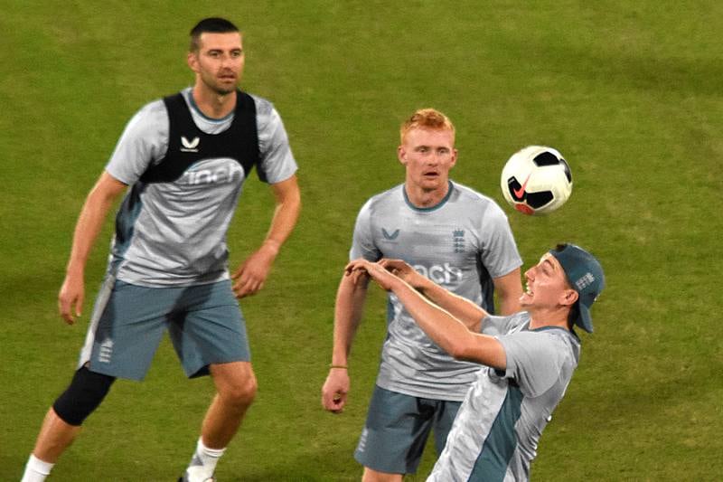 England team play football during training at the National Cricket Stadium in Karachi. England will play Pakistan in a seven-match T20 series which starts on September 20. EPA