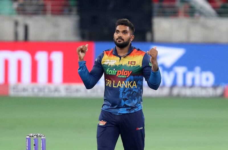 Sri Lanka's Wanindu Hasaranga celebrates after taking the wicket of Bangladesh batter Mahmudullah for 27. Pawan Singh / The National 