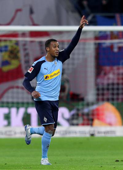 Moenchengladbach's French forward Alassane Plea celebrates after scoring during the German first division Bundesliga football match RB Leipzig v Borussia Moenchengladbach in Leipzig on February 1, 2020. (Photo by Ronny Hartmann / AFP) / RESTRICTIONS: DFL REGULATIONS PROHIBIT ANY USE OF PHOTOGRAPHS AS IMAGE SEQUENCES AND/OR QUASI-VIDEO