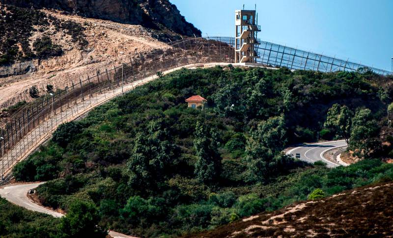 A guard tower overlooking the border fence encircling Spain's North African enclave of Ceuta, which lies on the Strait of Gibraltar, surrounded by Morocco. AFP