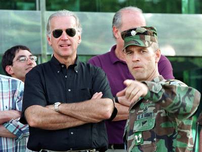 390131 01: US Senate Foreign Relations Committee Chairman Joseph Biden (D-DE), left, and Sen. Fred Thompson (R-TN), center, receive a briefing from Lt. Col. William Miller, UNC Security Battalion Commander, August 11, 2001 at the border village of Panmunjom, South Korea. Four US senators arrived in South Korea August 10 to discuss the issues of North Korea and security concerns with the country''s top leaders. (Photo by Chung Sung-Jun/Getty Images)