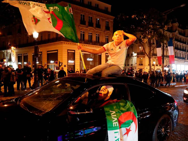 Algeria supporters celebrate their team reaching the Africa Cup of Nations final. AFP
