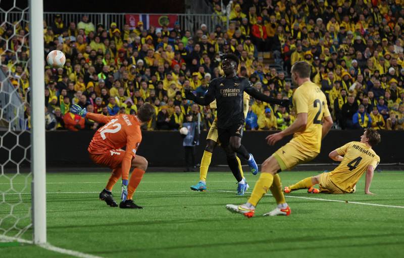 Arsenal's Bukayo Saka scores the first goal. Action Images