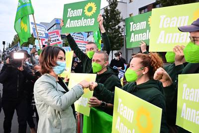 Green party supporters greet co-leader Annalena Baerbock in Berlin. AFP