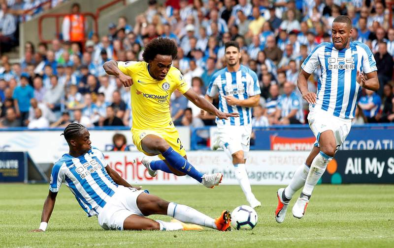 Chelsea's Willian in action with Huddersfield Town's Terence Kongolo. Action Images / Reuters