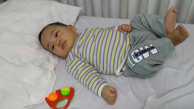 Universal Hospital in Abu Dhabi has looked after a baby they named Sebastian for the past nine months since his Filipina mother abandoned him and fled the country. Anwar Ahmad / The National