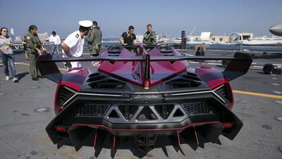 Lamborghini Veneno Roadster unveiled on an aircraft carrier in Abu Dhabi -  in pictures