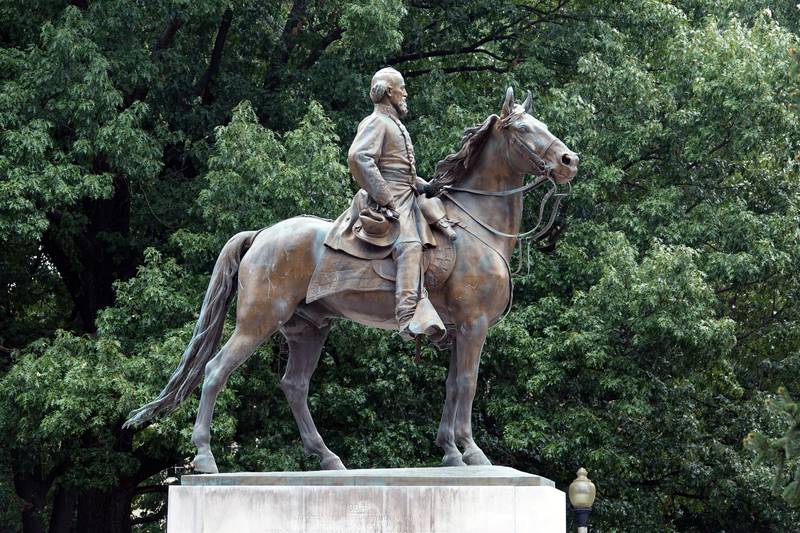 A different statue of Confederate general and early member of the Ku Klux Klan Nathan Bedford Forrest stood over his grave in Health Sciences Park in Memphis until it was removed in 2017. Reuters