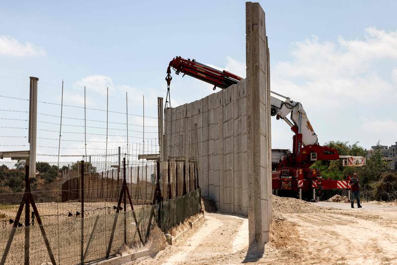 Israel says thousands of Palestinians cross into its land illegally  from the West Bank, through holes in the barrier.