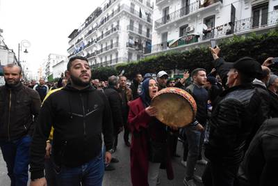 Demonstrators attend a protest to reject the presidential election results in Algiers. EPA