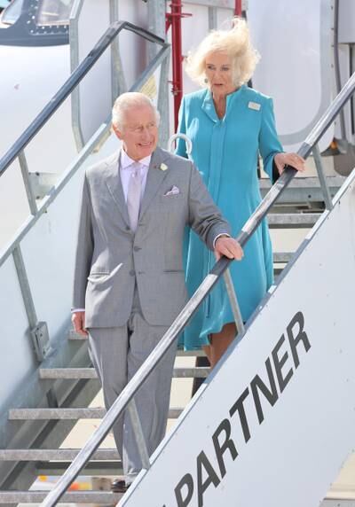 King Charles disembarks an aircraft with Queen Camilla as they arrive at Bordeaux-Merignac Airport. Reuters