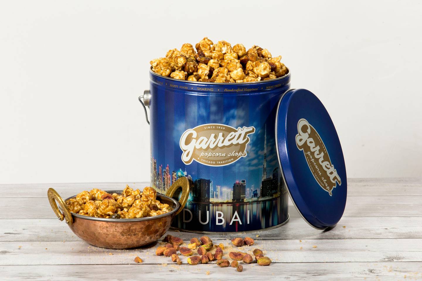 Handout of Garrett Popcorn. Courtesy of Garrett Popcorn *** Local Caption ***  Pistachio CaramelCrisp, Dubai Skyline Tin.jpg