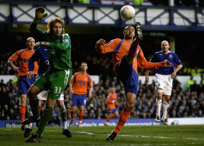 LIVERPOOL, UNITED KINGDOM - JANUARY 05:  Craig Davies of Oldham Athletic in action with Stefan Wessels of Everton during the FA Cup sponsored by E.ON 3rd Round match between Everton and  Oldham Athletic at Goodison Park on January 5, 2008 in Liverpool, England.  (Photo by Clive Brunskill/Getty Images)