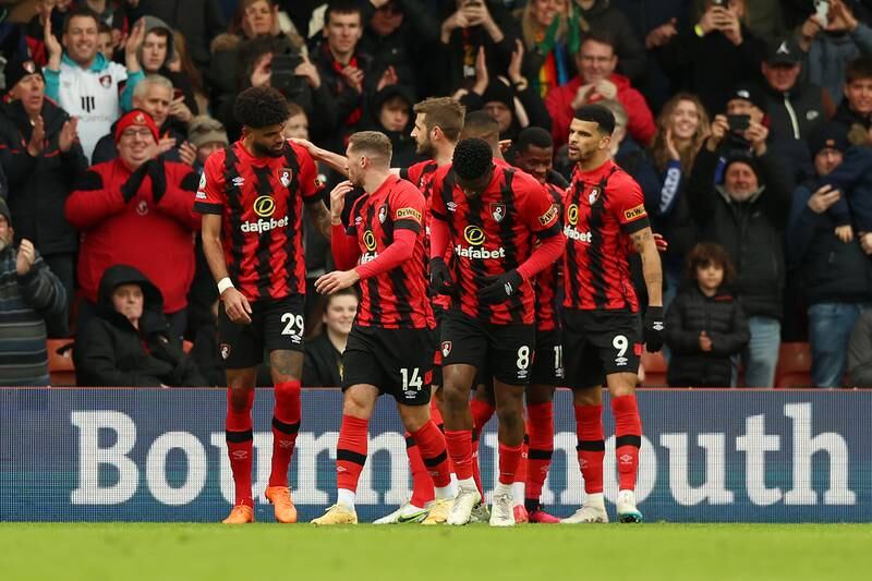 Philip Billing celebrates with teammates after putting Bournemouth ahead. Getty