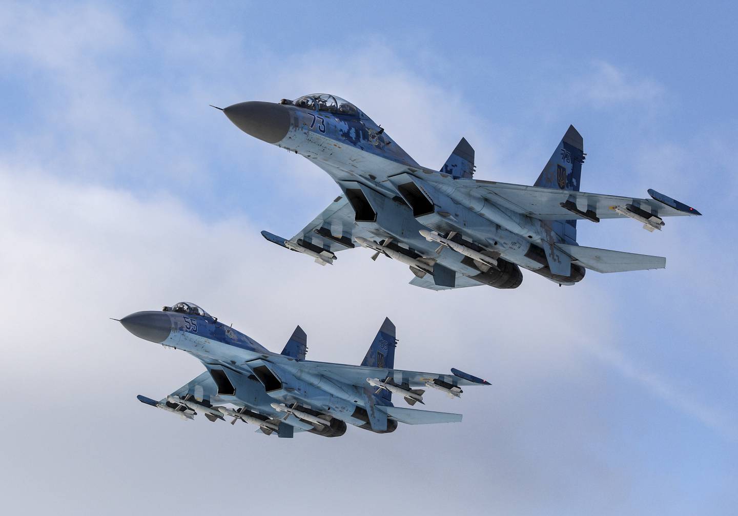 Su-27 fighter jets fly above a military base in the Zhytomyr region, Ukraine, in 2018. AP