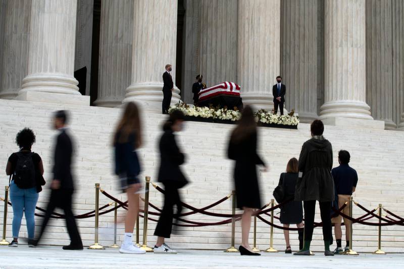 Mourners pay their respects as Justice Ruth Bader Ginsburg lies in repose in front of the US Supreme Court building in Washington on September 24, 2020. AP Photo