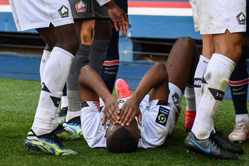 Tiago Djalo lies on the ground after a clash with Neymar. AFP