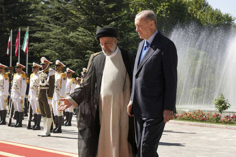 Iranian President Ebrahim Raisi welcomes Turkish President Recep Tayyip Erdogan in Tehran in July. AP Photo