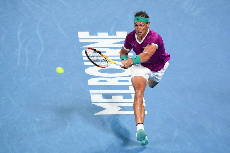 Rafael Nadal hits a return against Daniil Medvedev. AFP