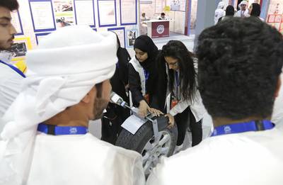 Students from Al Ma’ali International Private School in Abu Dhabi exhibit their Automatic Tyre Gripper. Jeffrey E Biteng / The National