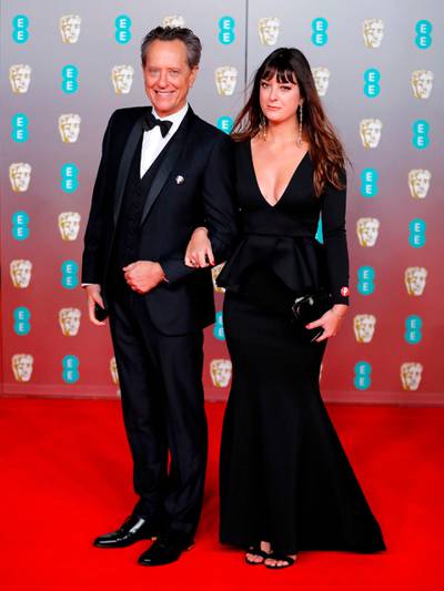 Richard E Grant and his daughter Olivia arrive at the 2020 EE British Academy Film Awards at Royal Albert Hall on Sunday, February 2. AFP