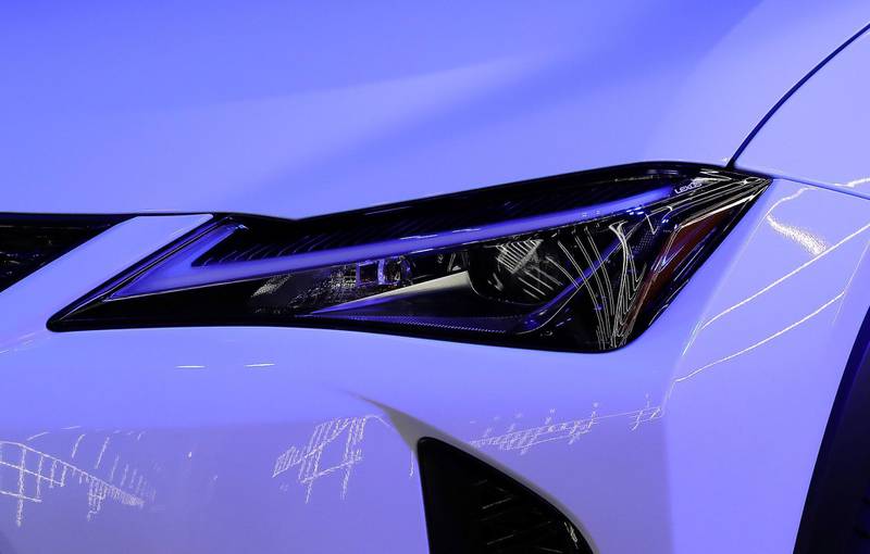 DUBAI , UNITED ARAB EMIRATES , December 8  ��� 2018 :- Front headlight of the new Lexux UX crossover SUV launched at the Emirates Financial Tower in Dubai. ( Pawan Singh / The National ) For Weekend. Story by Adam Workman