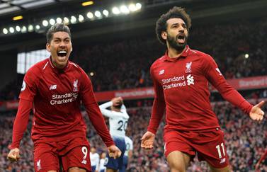Mohamed Salah and Roberto Firmino after Toby Alderweireld's late own goal in April's Premier League match between Liverpool and Tottenham. EPA