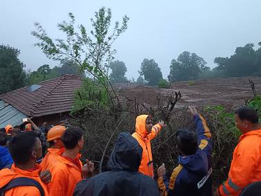 Sixteen killed and dozens trapped after rain triggers landslide in India's Raigad