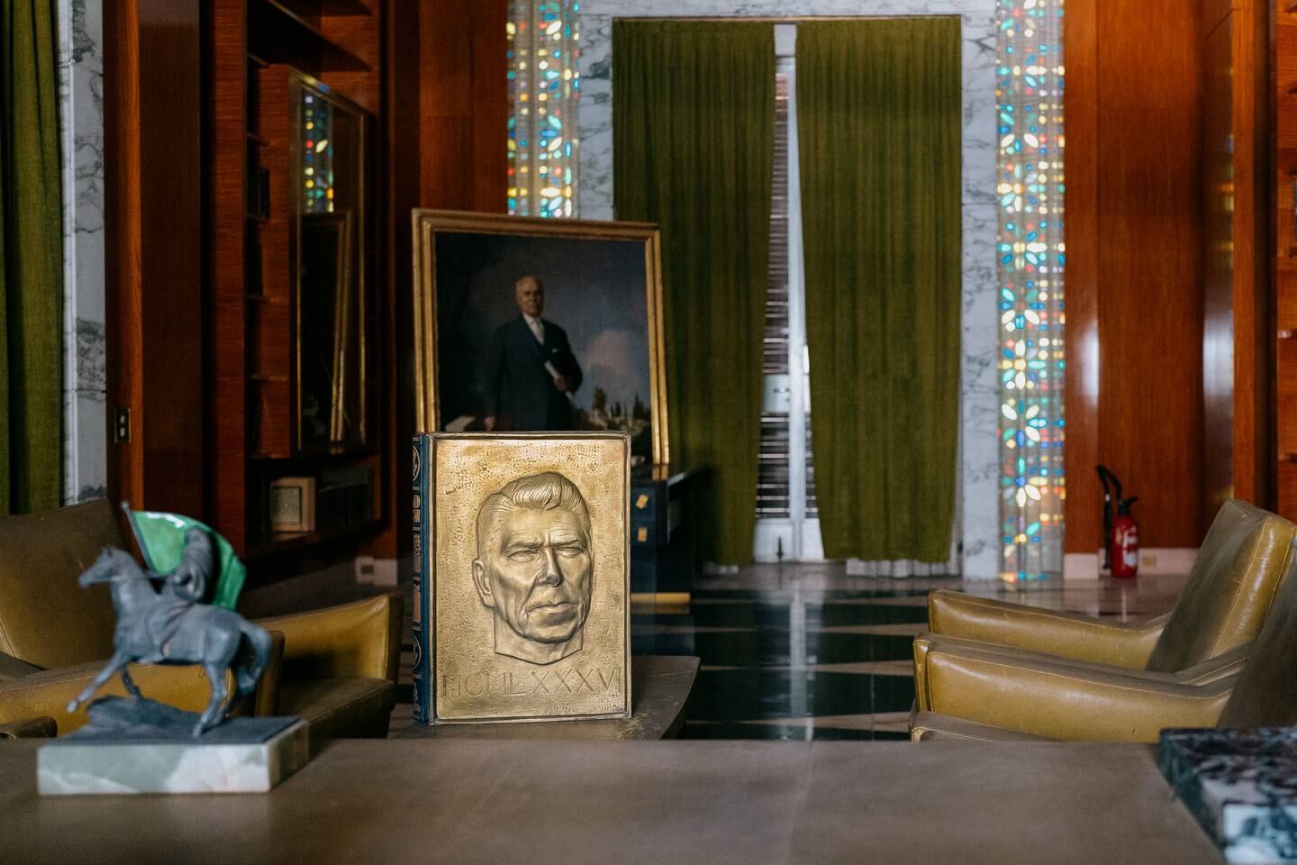 Among the many gifts and possessions on display at the museum is a copy of Ronald Regan's biography, with an haut-relief bronze of the president on its cover. Erin Clare Brown / The National