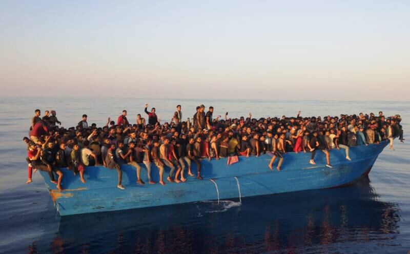A previous migrant boat off the island of Lampedusa in 2021. EPA 