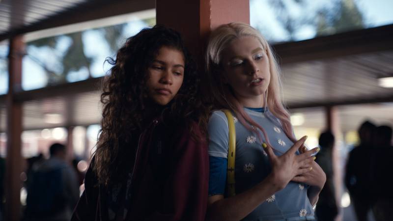 This image released by HBO shows Zendaya, left, and Hunter Schafer in a scene from "Euphoria," airing Sundays at 10 p.m. ET on HBO. (HBO via AP)