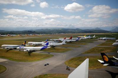 FILE PHOTO: Airplanes sit on the tarmac at the site of French aircraft storage and recycling company Tarmac Aerosave in Tarbes following the coronavirus disease (COVID-19) outbreak in France, June 19, 2020. Picture taken June 19, 2020. REUTERS/Stephane Mahe/File Photo