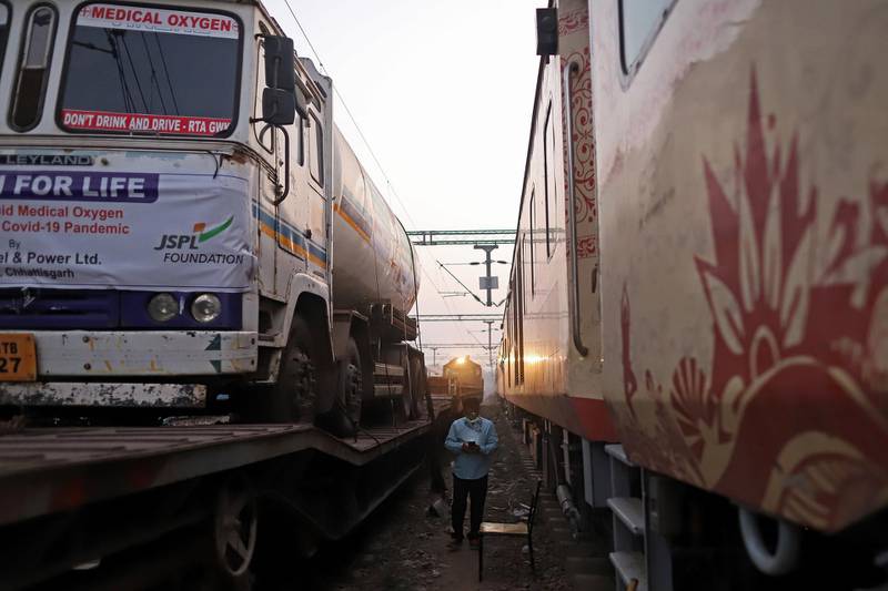 Medical oxygen tankers are delivered via the ‘Oxygen Express’ train to a Delhi railway station. Bloomberg