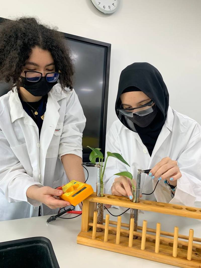 Nada Nafisa and Aya Al Zayed working on their Eco-current project. Photo: Al Khaleej International School