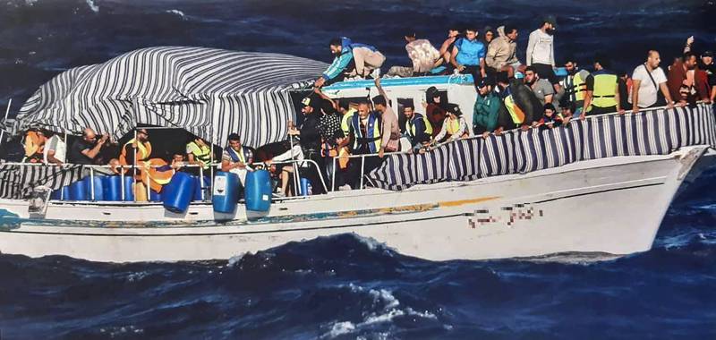 Migrants on a boat off Karpathos island, Greece. Hellenic Coastguard / AFP