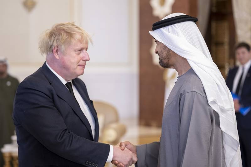 UK Prime Minister Boris Johnson speaks with Sheikh Mohamed.  Abdulla Al Junaibi for the Ministry of Presidential Affairs
