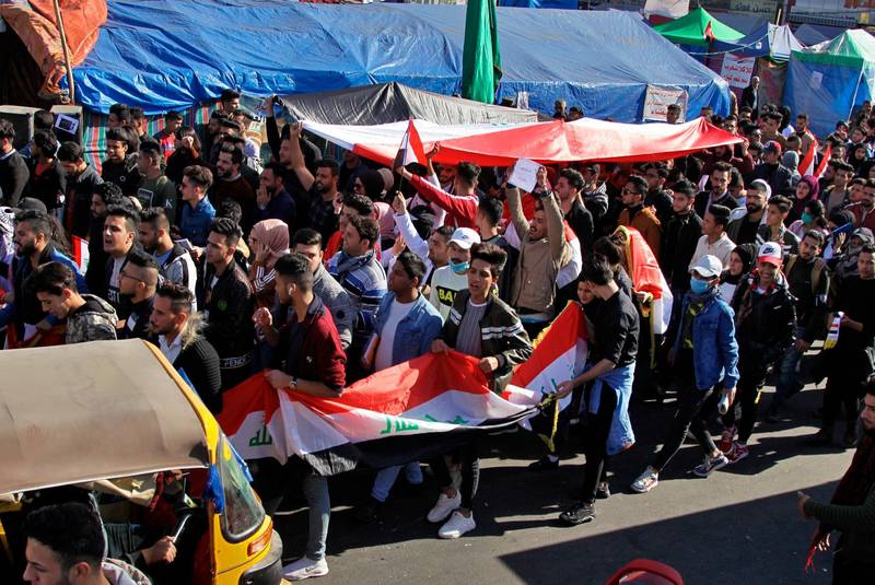 Anti-government protesters gather in Tahrir Square during a sit-in, Baghdad, Iraq, Tuesday, December  24, 2019. AP