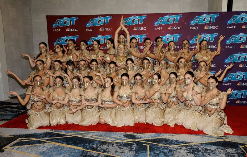Nadim Cherfan, centre, with the dance group Mayyas, winners of season 17. Getty Images