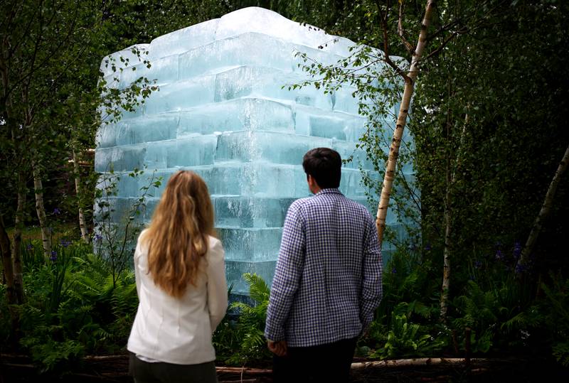 People view The Plantman's Ice Garden at the RHS Chelsea Flower Show in London. PA