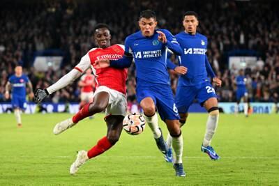 Thiago Silva of Chelsea is challenged by Eddie Nketiah of Arsenal. Getty